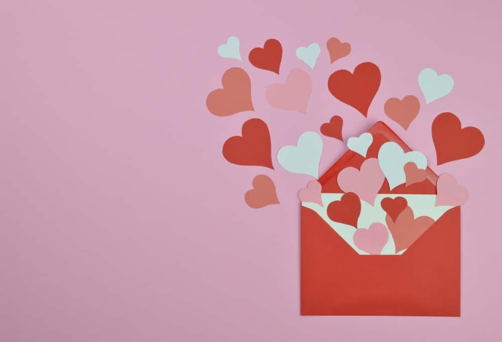 Open envelope with hearts coming out- valentines day graphic