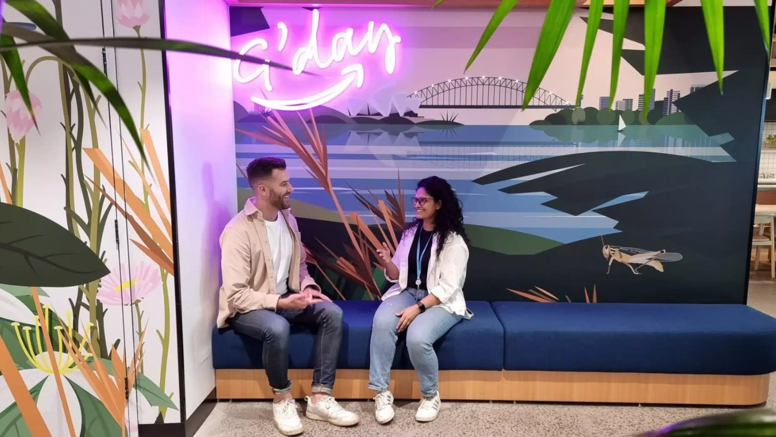 man and women taling in amazon office